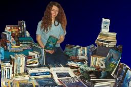 [Julia with many, many dolphin books]